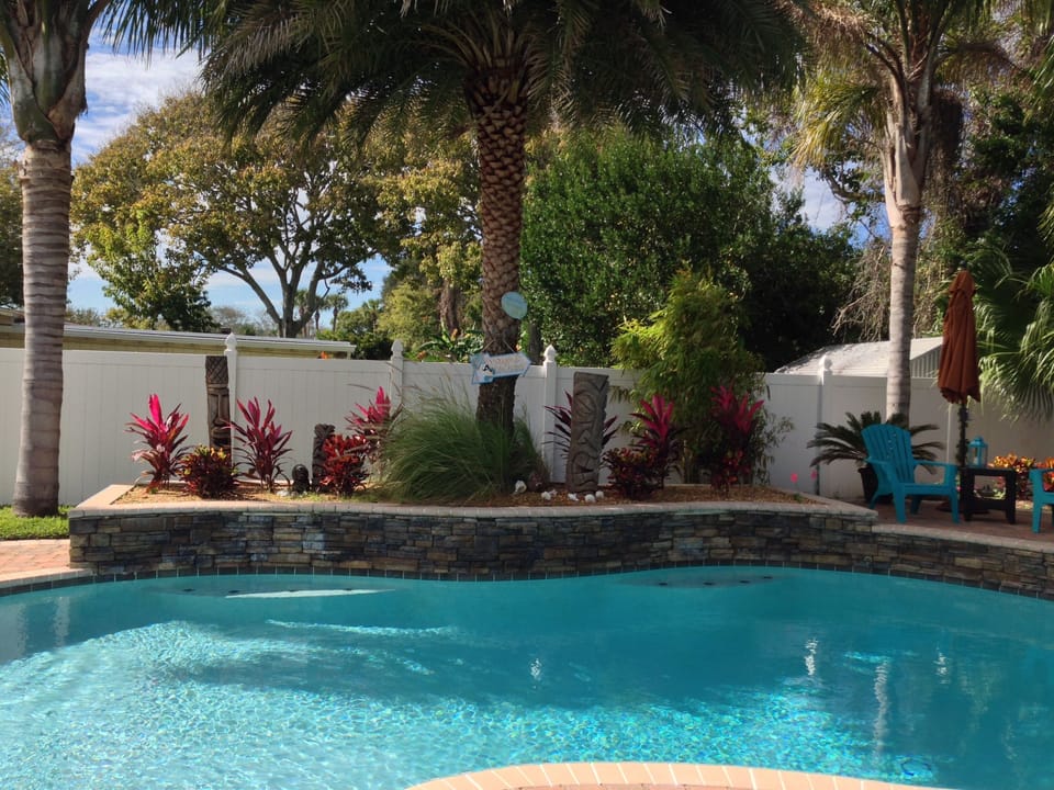 Enjoy full pool view from Great Room.EZ access dbl doors full view glass.