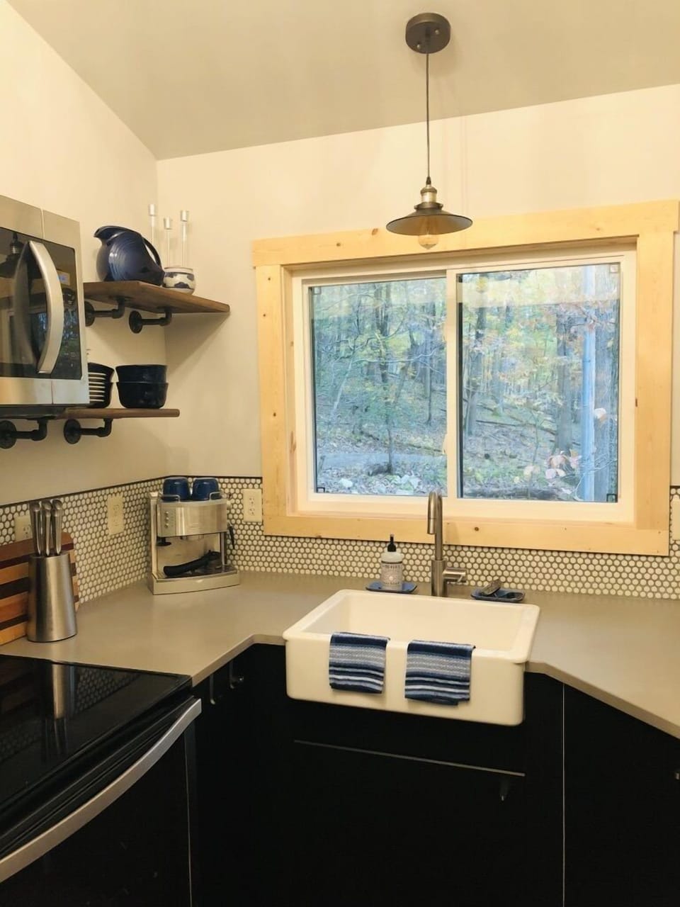 Washing up made more enjoyable with a view to the woods. 