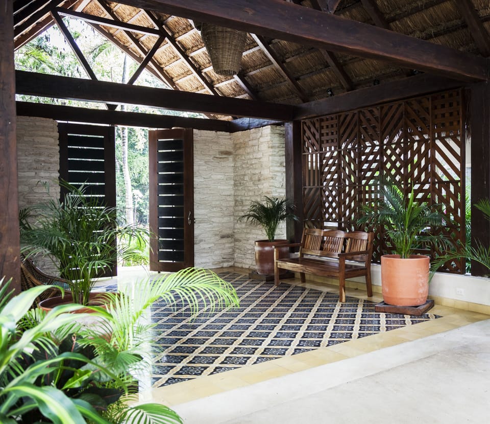 Welcome to paradise, inside waiting area under the cooling palapa structure