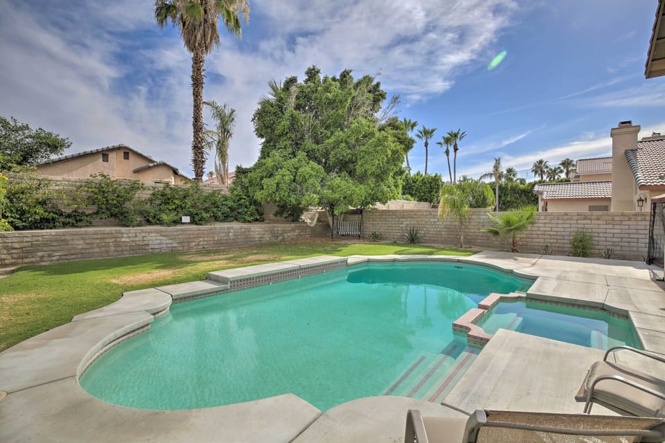 Spend leisurely days soaking up the sun at this sweet La Quinta vacation home.