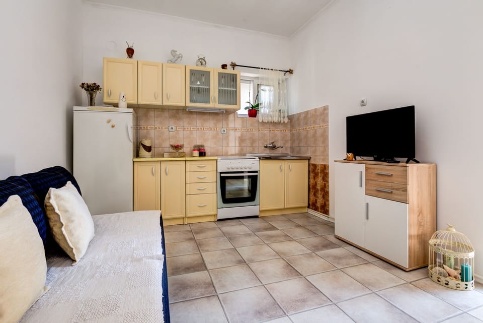 Kitchen is fully equipped with all the necessary amenities. 