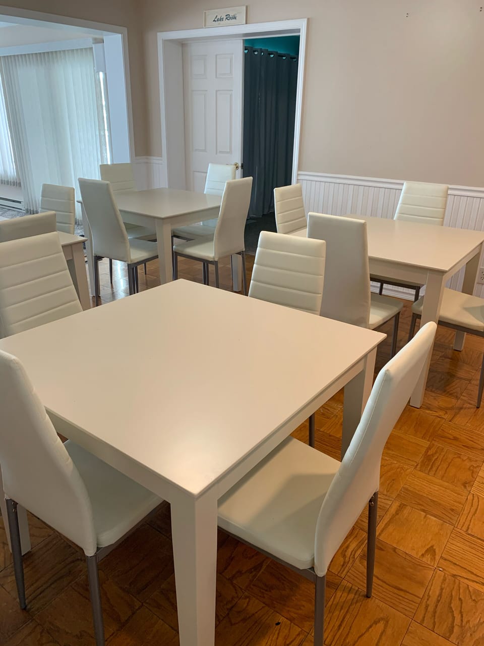 New lower dining room set up, 4 tables with 16 chairs for an amazing game night!