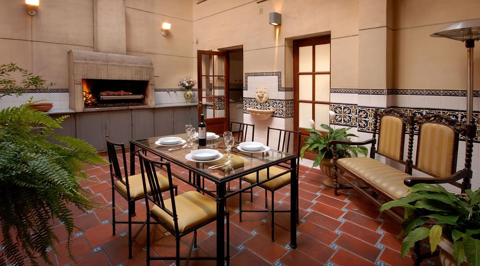 Central patio.  Our favorite spot!  Note parrilla on left and dining space.
