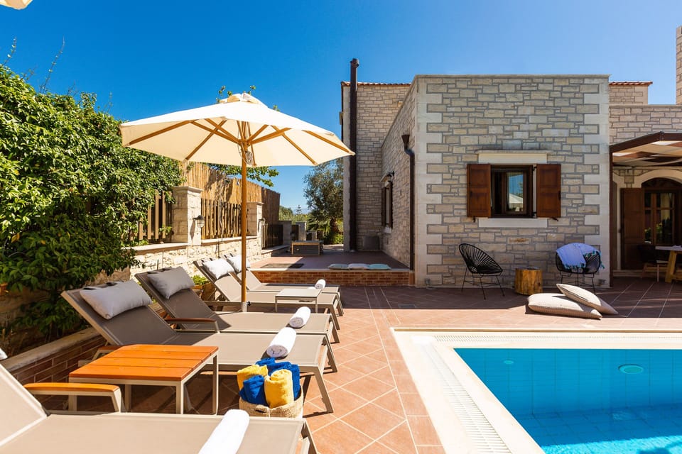 Sunbeds at the room of the swimming pool