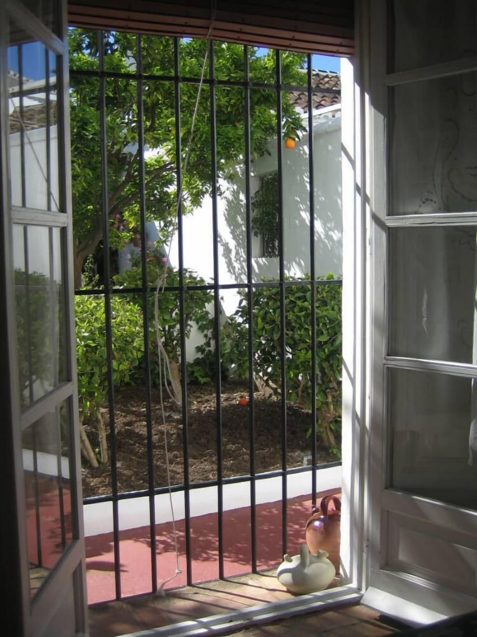 Balcony Room  2, overlooking a small garden.