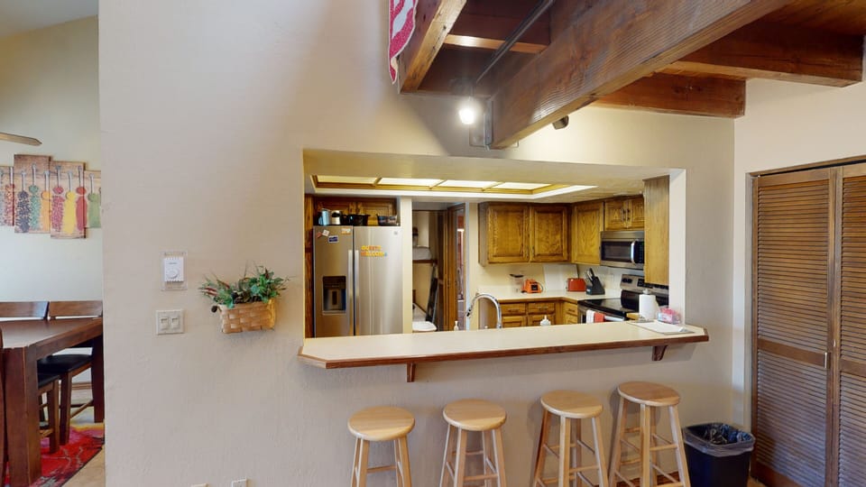  4 Seat Bar & Separate Dining Area Off The Full Kitchen
