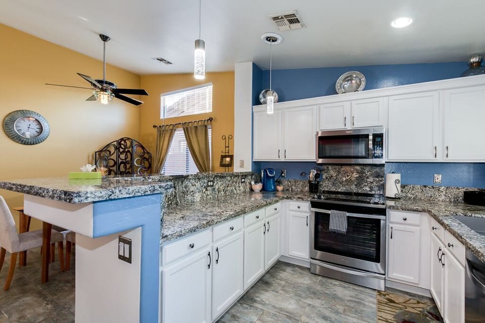 All SS appliances and custom granite.