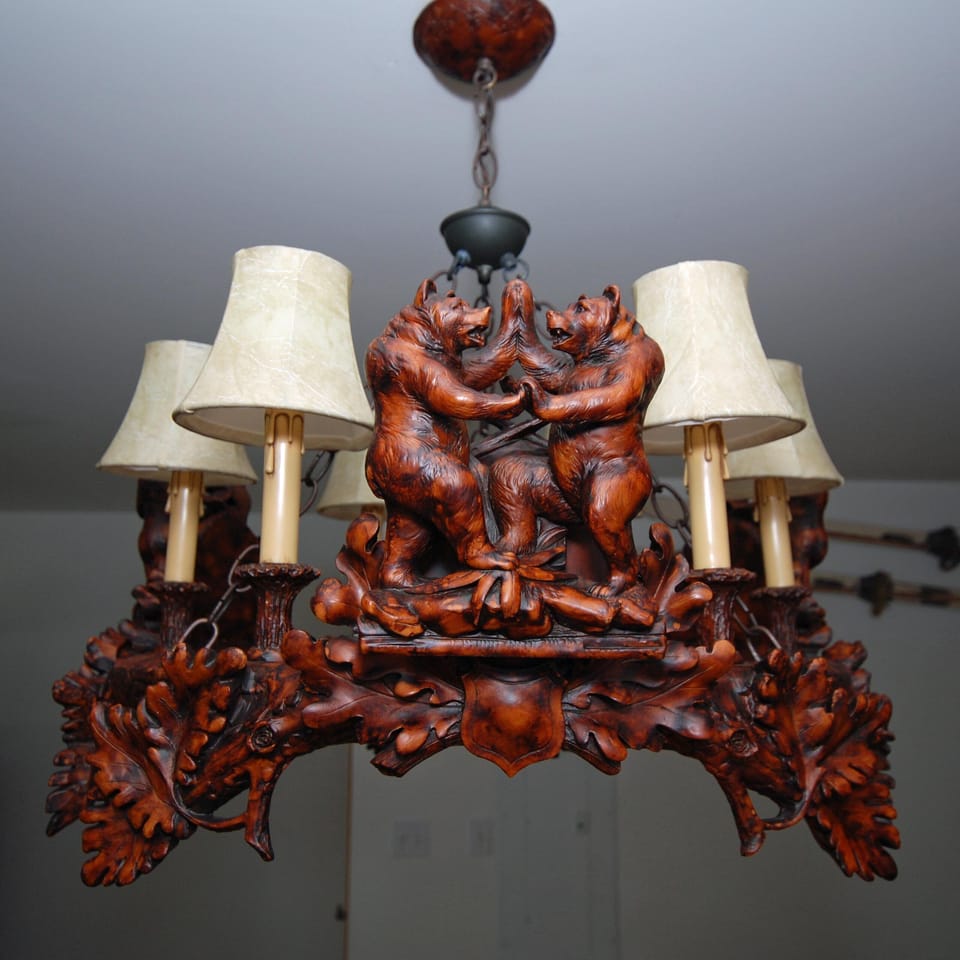 Remarkable hand carved chandelier over the dining table.   Look, but please don't touch.