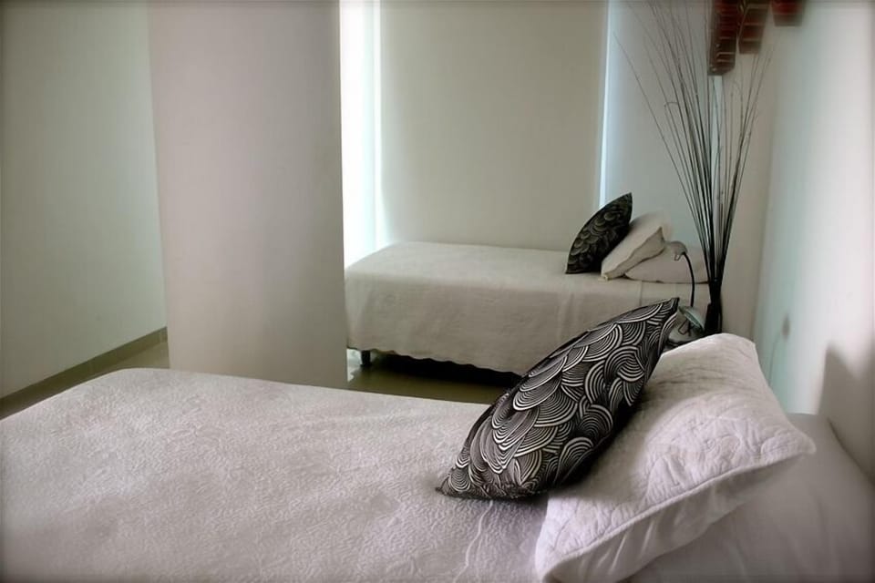 Second guest bedroom with more wonderful views...just behind those shades...