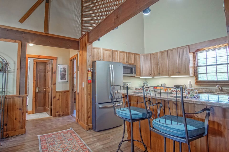 The kitchen bar has seating for 2.