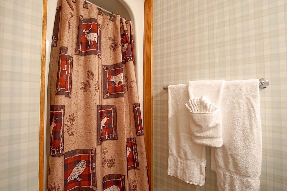 There is a standing shower only in this bathroom.