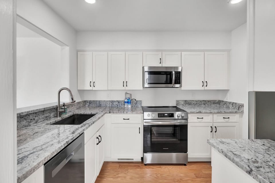 Your fully equipped kitchen features granite countertops, stainless steel appliances, and plenty of cabinet space for all your culinary adventures.
