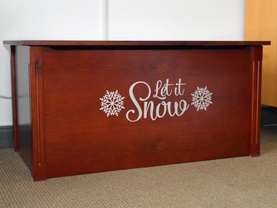 You'll find clean sheets and pillows to make up the sofabed in the "Let it Snow" chest.