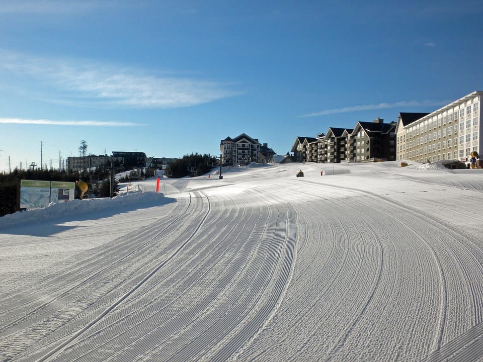 Your morning wake up call. Is the coffee ready?  The building on the right of this photo is Expedition Station.