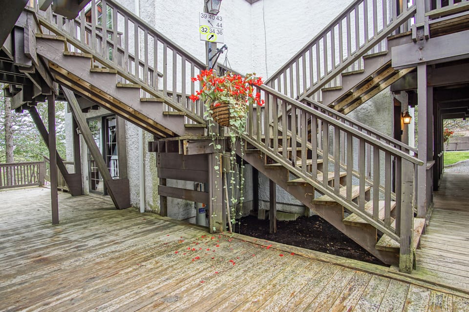 A set of stairs leads up to the unit.