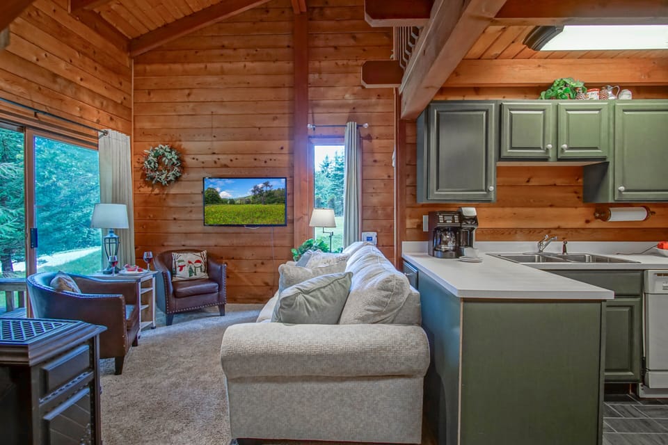 View of living room and kitchen area