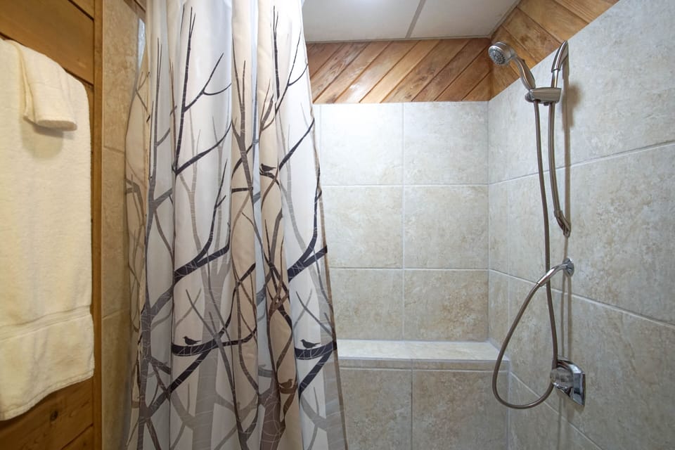 Shower located in bathroom in the loft