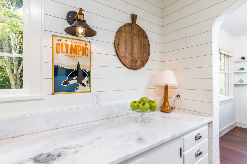updated kitchen with stainless steel appliances and quartzite counters
