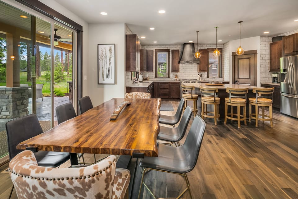 Heart of the Hill in Suncadia Resort - The Dining Table seats 8 with additional seating for 4 at the over-sized kitchen island.
