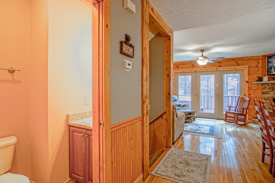 Here you can see the half bath located on the main level beside the stairs from the ground level.