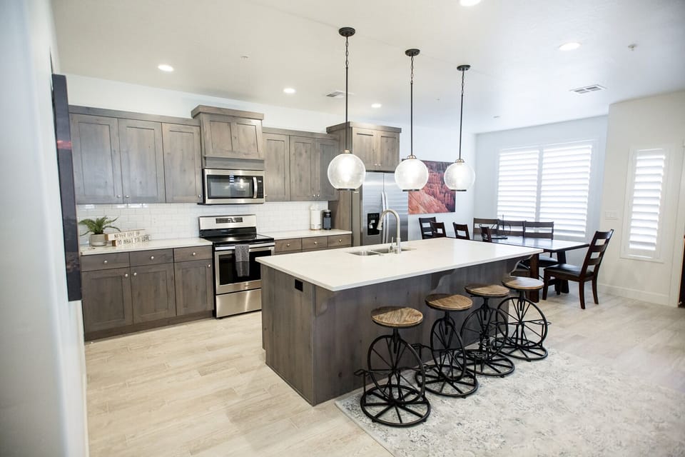 right kitchen and dining area — perfect for family dinners or casual breakfasts on these unique bike stools.