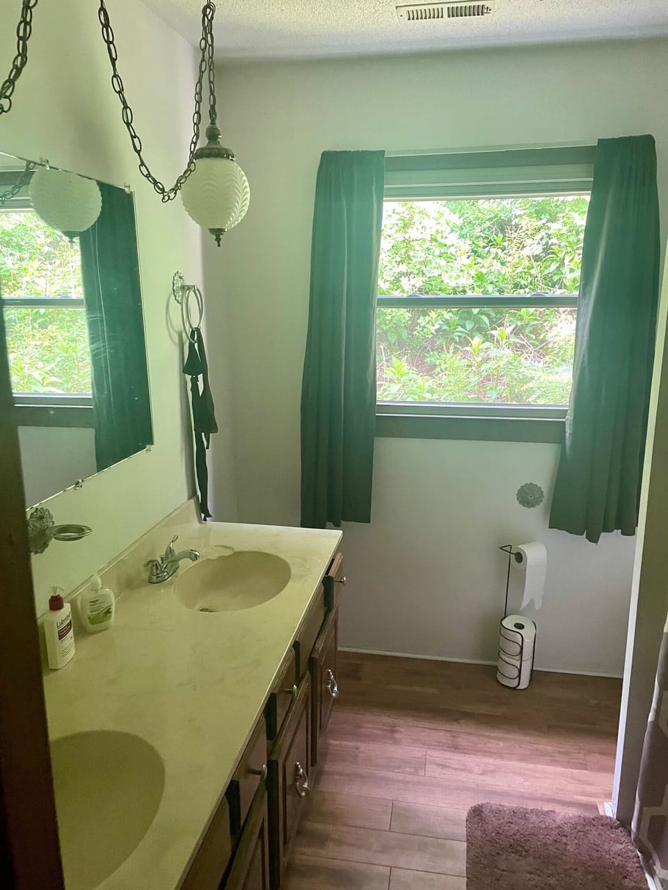 Downstairs master bathroom with two sinks