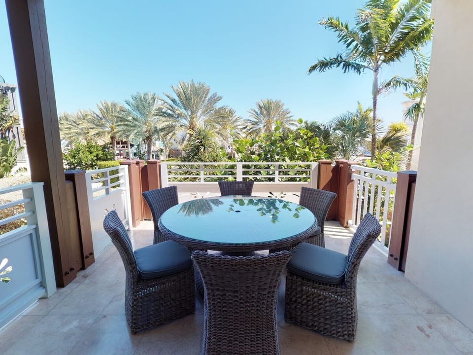 Residence #3829 - Second Floor Balcony with Table and Chairs