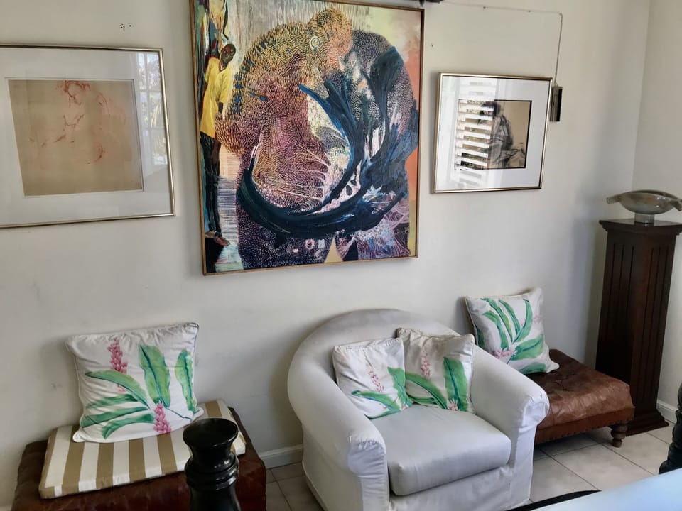 South wall view of the 2nd bedroom. Art by Oliver Myrie and Marcia Biggs.
