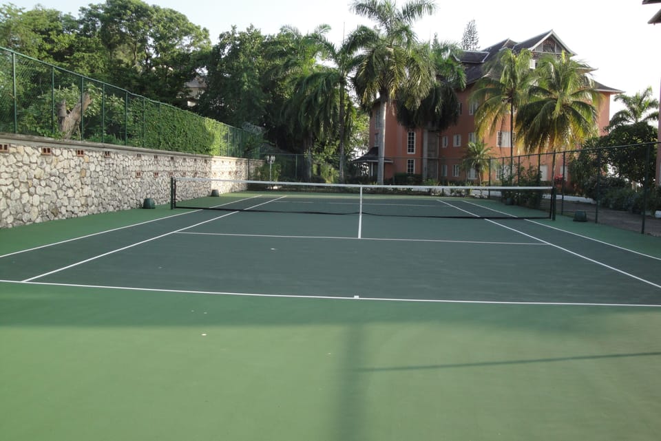 Tennis Court. Reserve  court time with the security guard at the main gate.