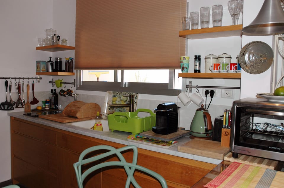 designed kitchen with Nespresso machine