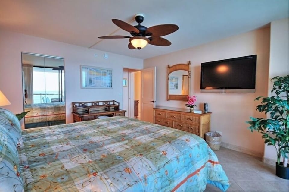 Smart TV, desk and plenty of storage.