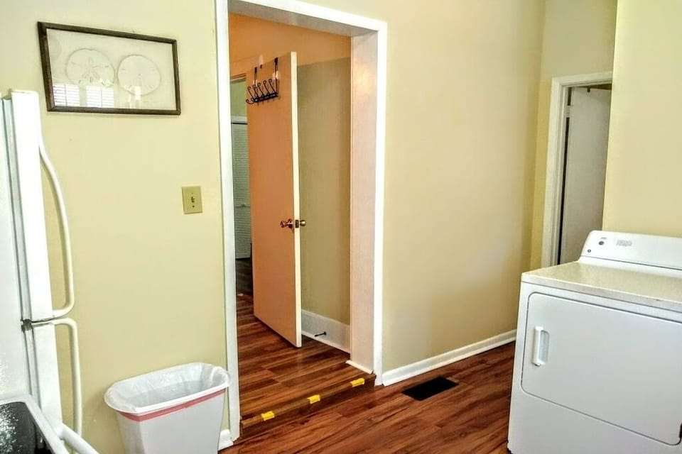 Hallway to bathroom in kitchen. 3 sm step up/downs inside unit WATCH YOUR STEP
