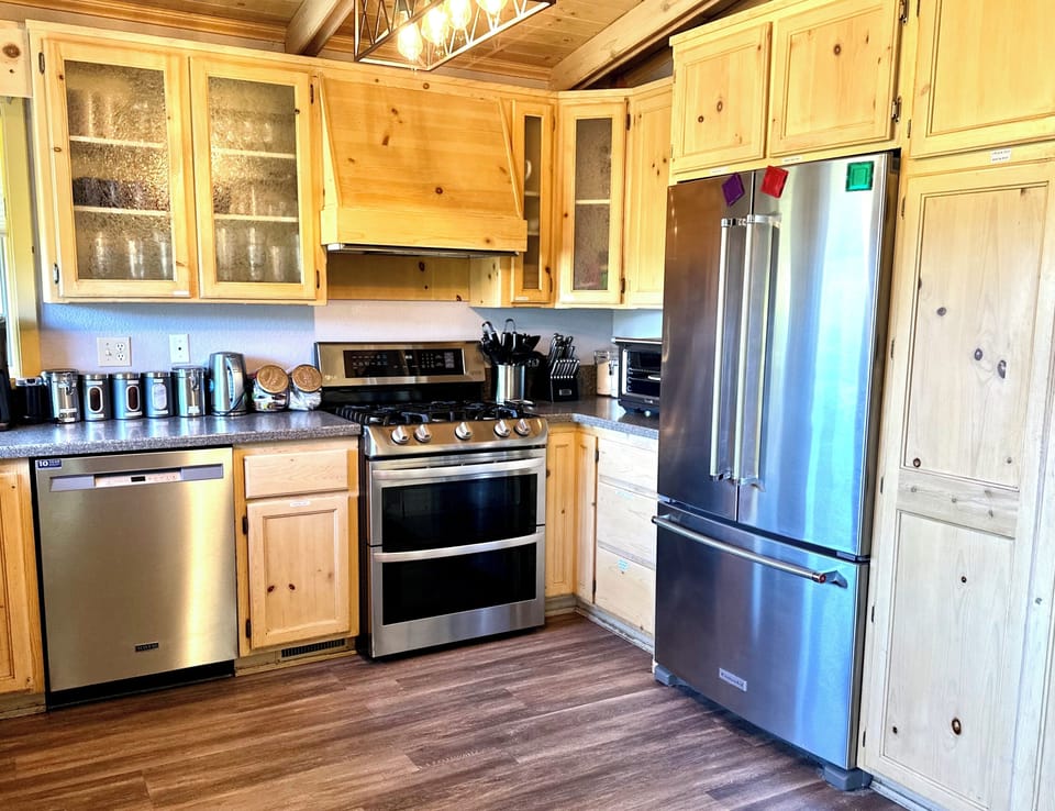 Fridge with Ice and Water inside. We have Everything you need to cook for 16 ppl