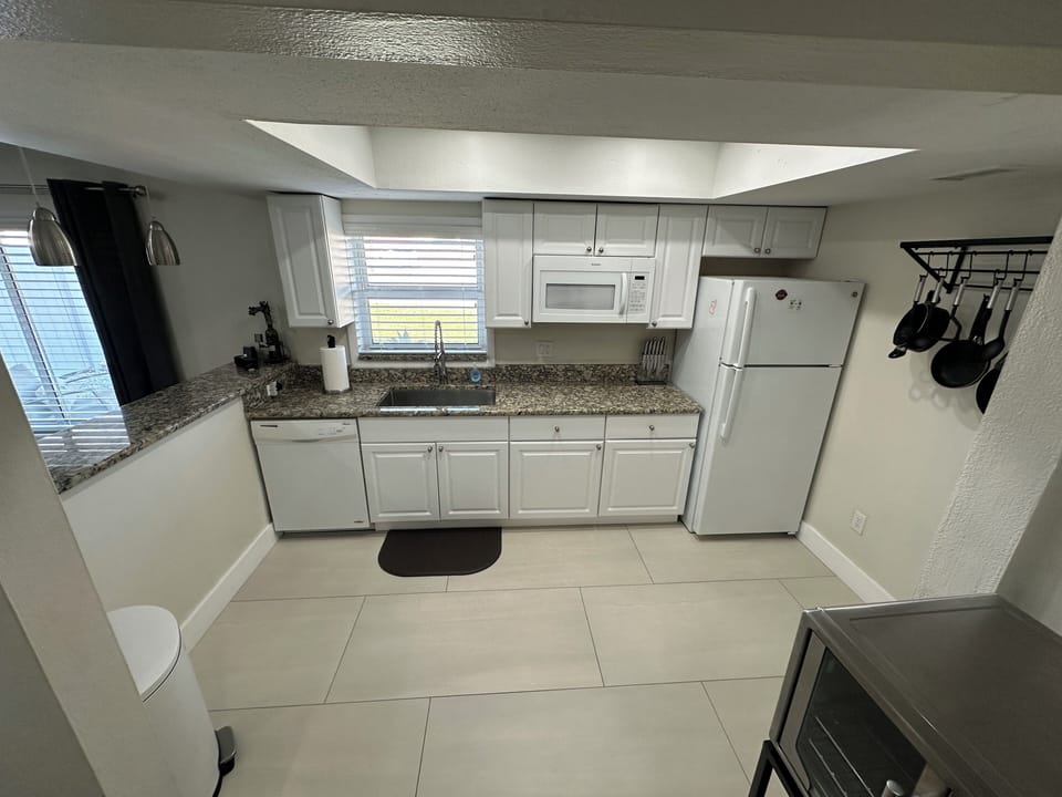 Kitchen - Does NOT include stove top or oven). Do provide hot plates/airfryer)