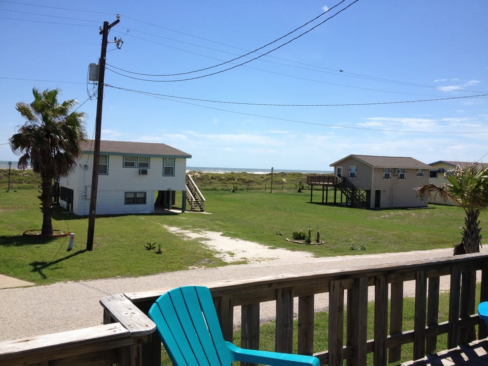 Sip, sit, and savor the sea from this breezy, oversized balcony.