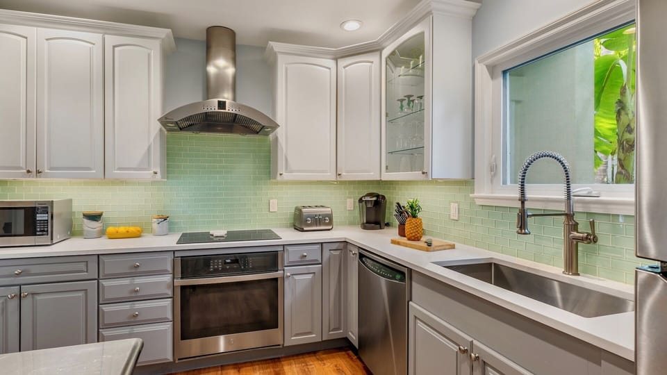 The kitchen has stainless steel appliances...