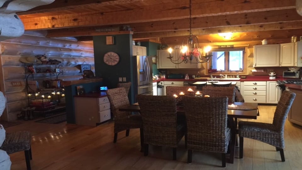 Kitchen from living room, dining table expands for additional seating