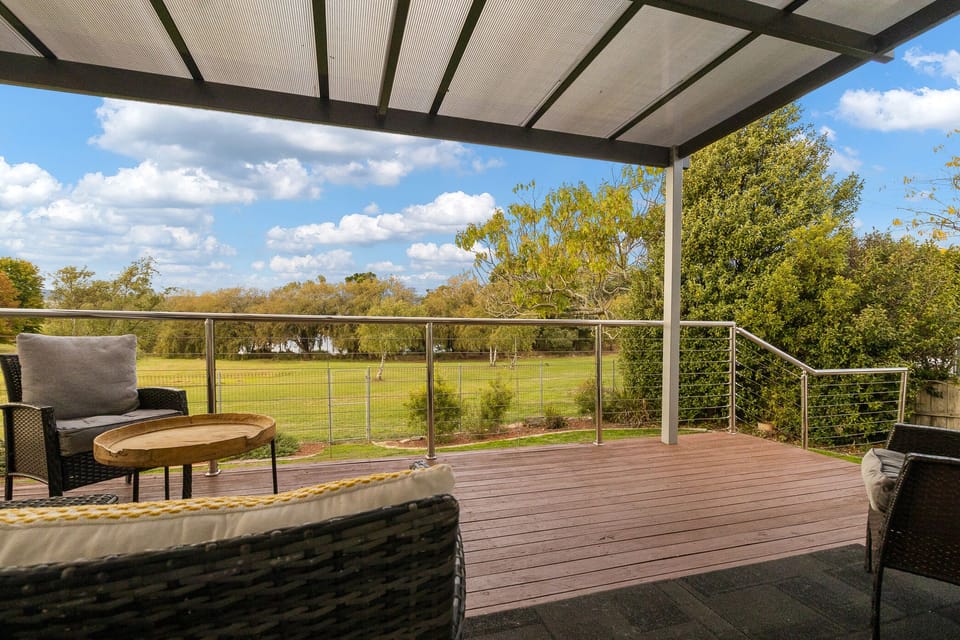 A secure backyard with multiple walking tracks including around the lake!