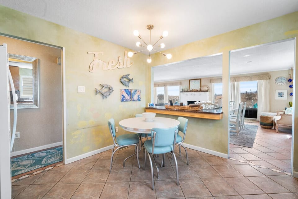 Casual dining nook with counter seating and bright morning light.