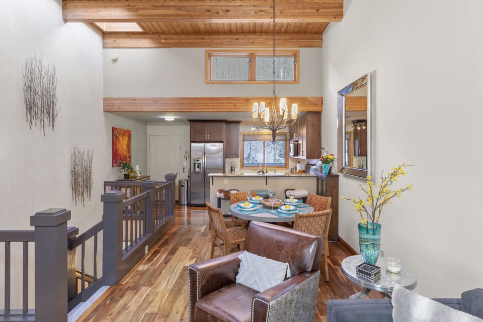 Upper level - colorful and contemporary living, dining and kitchen
