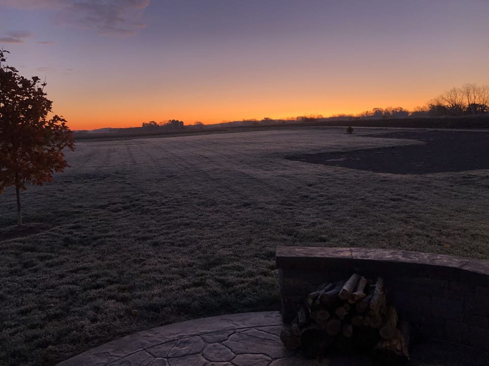 Peaceful country sunrise from the fire pit   