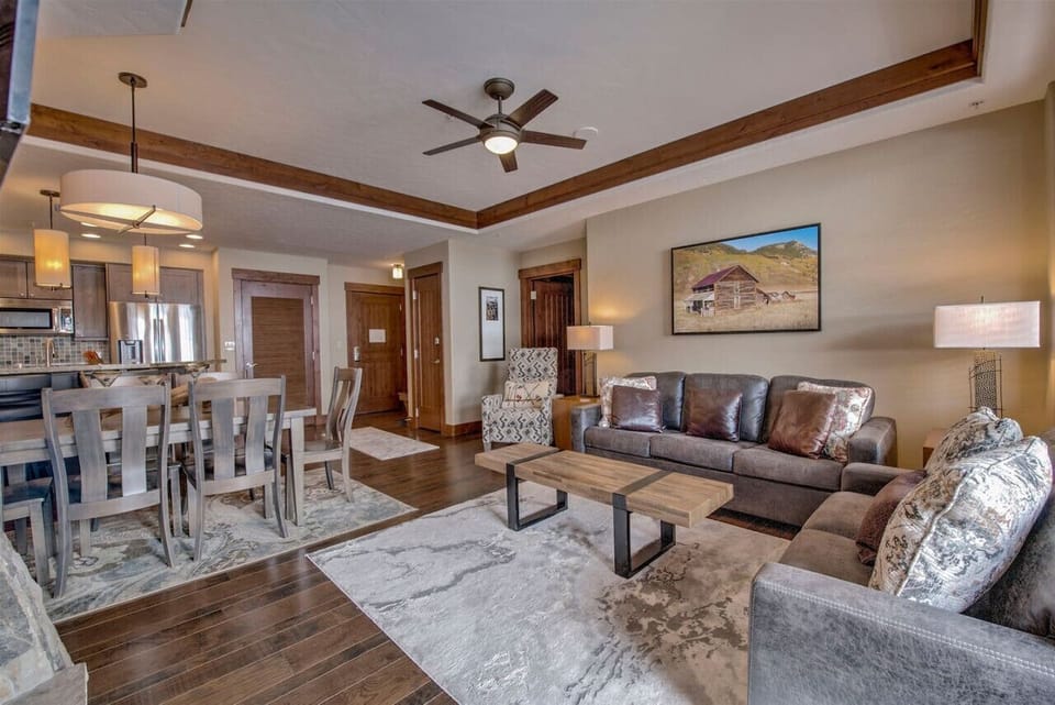 The open floor plan creates a spacious, yet cozy mountain feel.