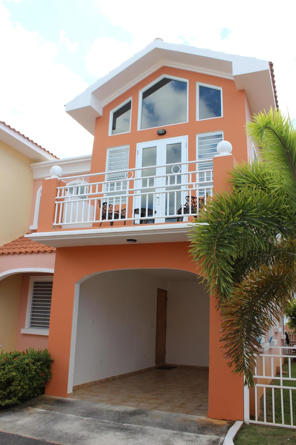 Front of house with car port