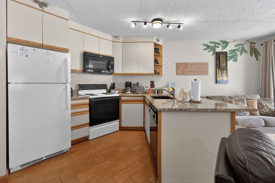 Your fully-equipped kitchen and open living space invite you to cook, gather, and relax—everything you need for a cozy, home-away-from-home experience.