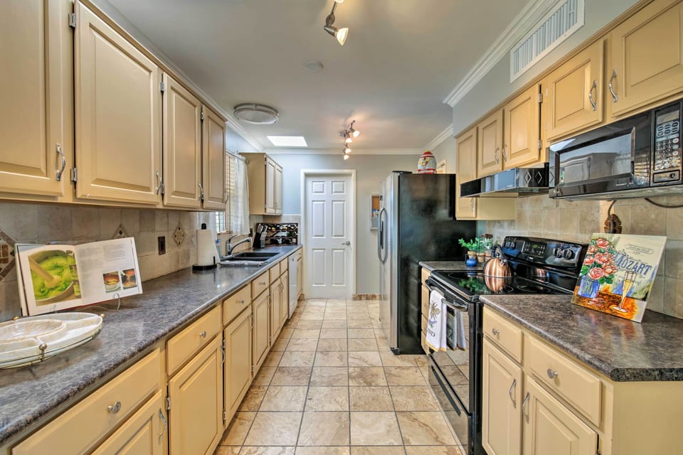 Whip up a delicious meal in the fully equipped kitchen.