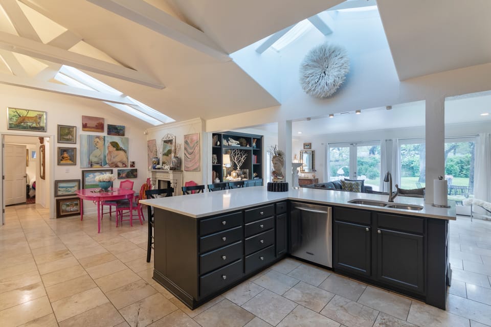 Open living space:  dining area and kitchen.