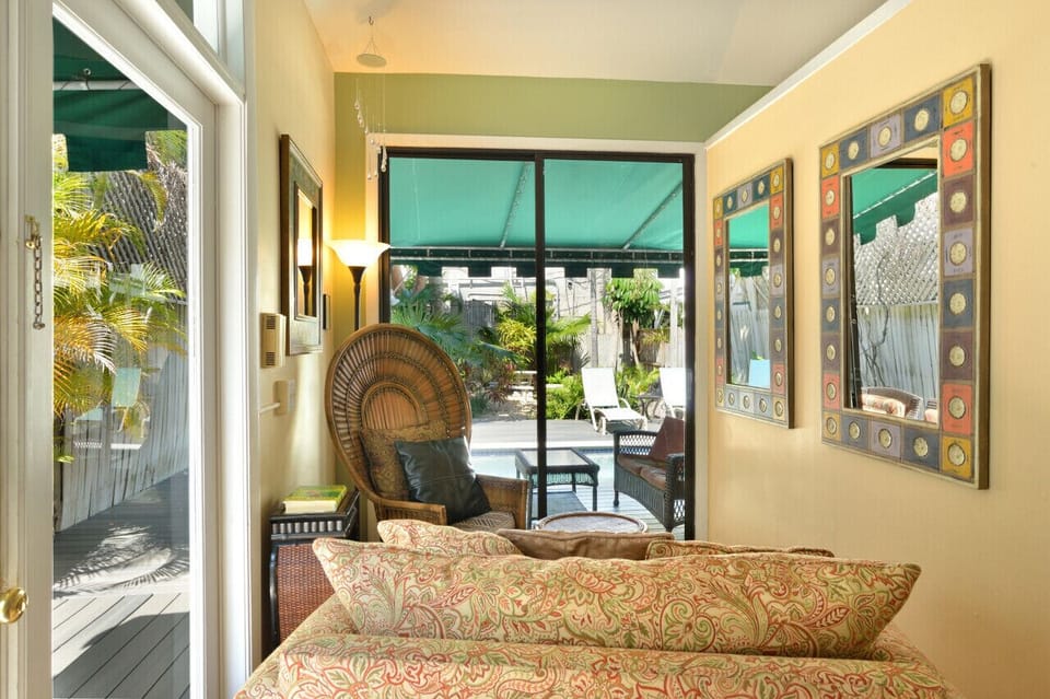 Living Room with Sliding Doors to Pool Deck