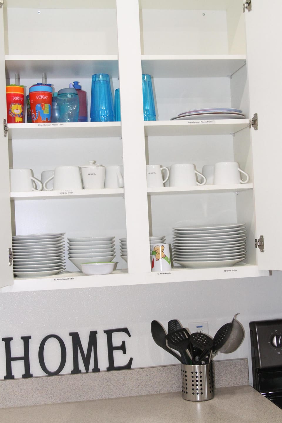 Fully stocked kitchen cabinets.