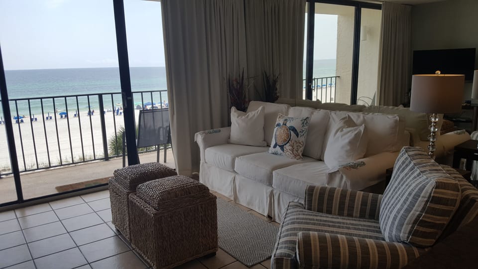 Queen slipcovered sofa sleeper and swivel rocker. Gorgeous Oceanview. 