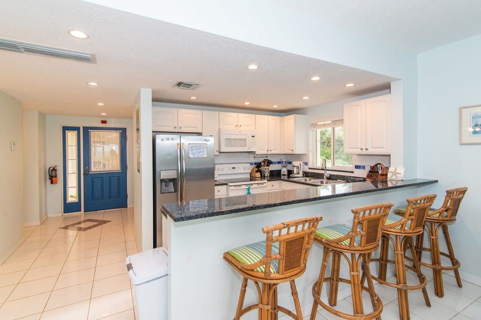 Eat at this awesome breakfast bar. Even the kitchen has views! 